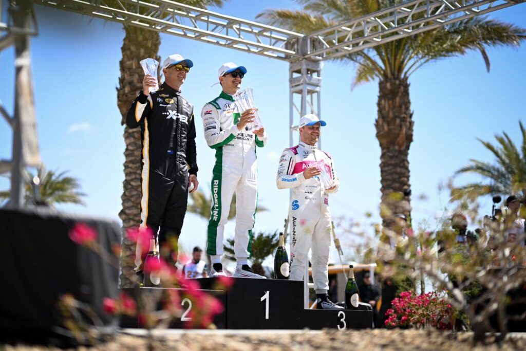 Alex Palou on the top step of the podium 