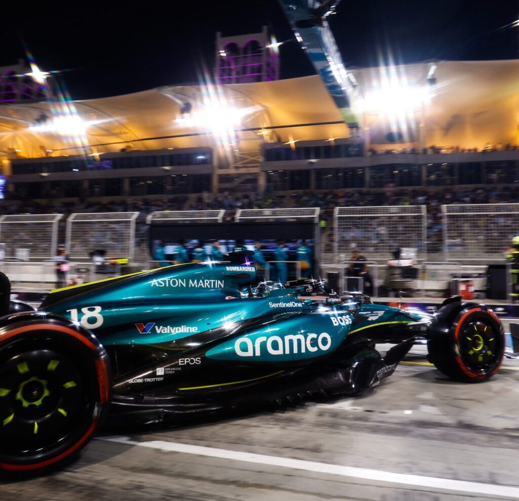 Aston Martin pulling out of the pit on the way to the track 