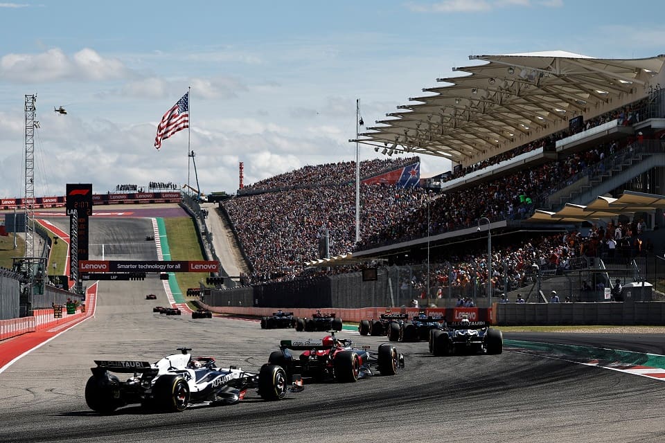 AUSTIN, TEXAS - OCTOBER 22: Daniel Ricciardo of Australia driving the (3) Scuderia AlphaTauri AT04 chases Zhou Guanyu of China driving the (24) Alfa Romeo F1 C43 Ferrari on track during the F1 Grand Prix of United States at Circuit of The Americas on October 22, 2023 in Austin, Texas. (Photo by Chris Graythen/Getty Images) // Getty Images / Red Bull Content Pool // SI202310220676 // Usage for editorial use only //